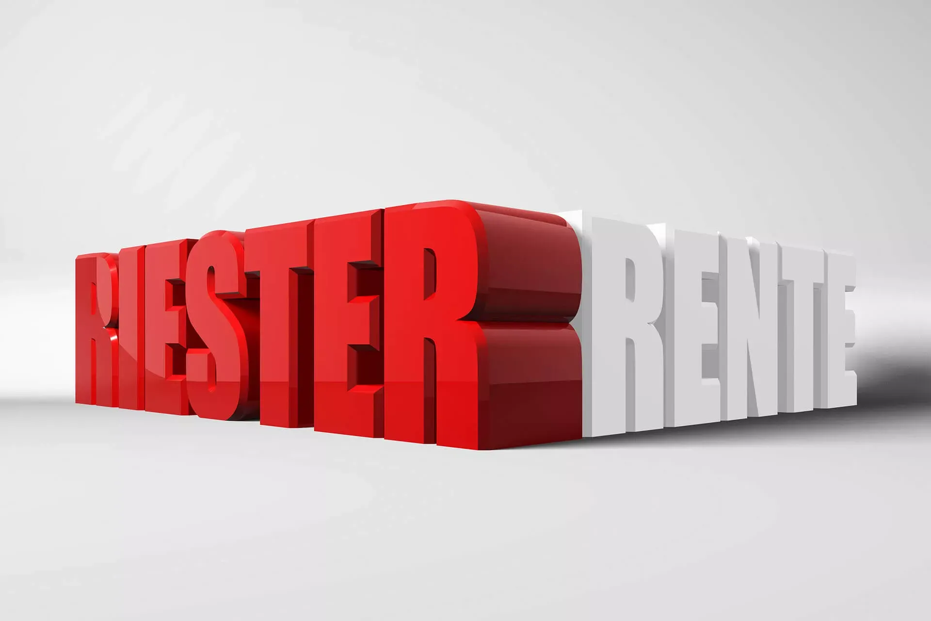 Riester Rente steht in dreidimensionalen Lettern, das Wort Riester in rot und das Wort Rente in weiß bilden einen rechten Winkel. Riester Rente steht in dreidimensionalen Lettern, das Wort Riester in rot und das Wort Rente in weiß bilden einen rechten Winkel.
