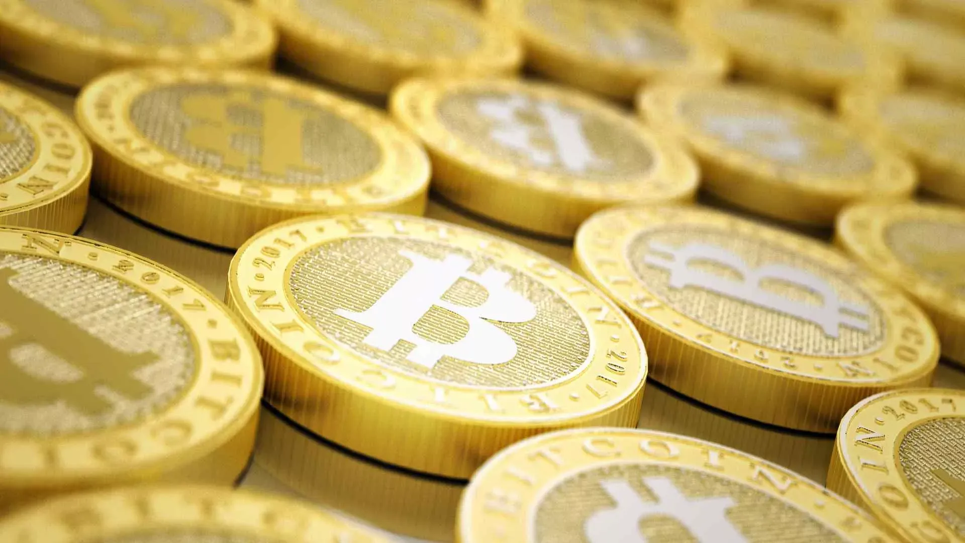 Bitcoin-Münzen in Gold. Bild: IMAGO / Science Photo Library / MARK GARLICK Bitcoin-Münzen in Gold. Bild: IMAGO / Science Photo Library / MARK GARLICK