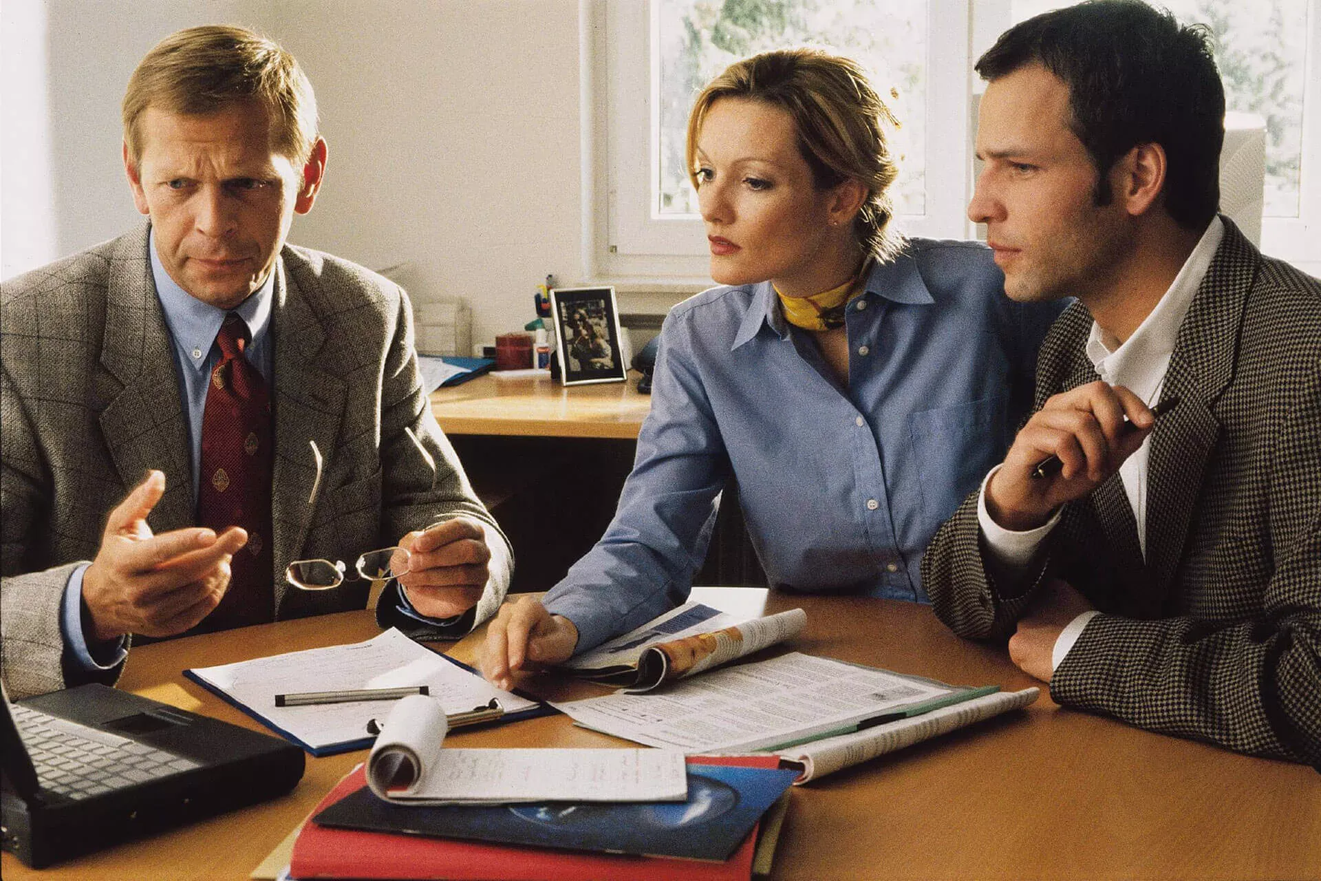 Ehepaar in einem Beratungsgespräch mit einem Finanzberater. Ehepaar in einem Beratungsgespräch mit einem Finanzberater.